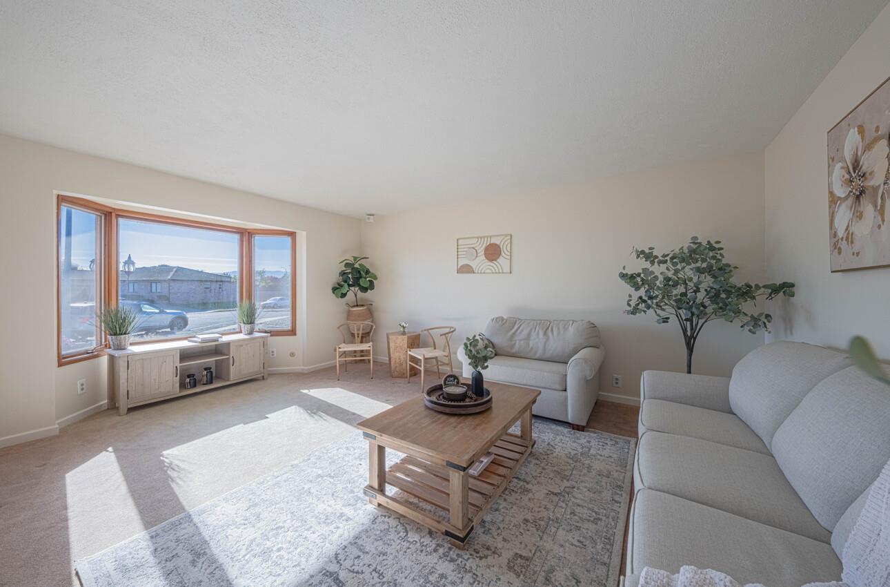 1527 Atherton Way Salinas, CA 93906 - Photo 7 of 64 a living room with furniture and a large window