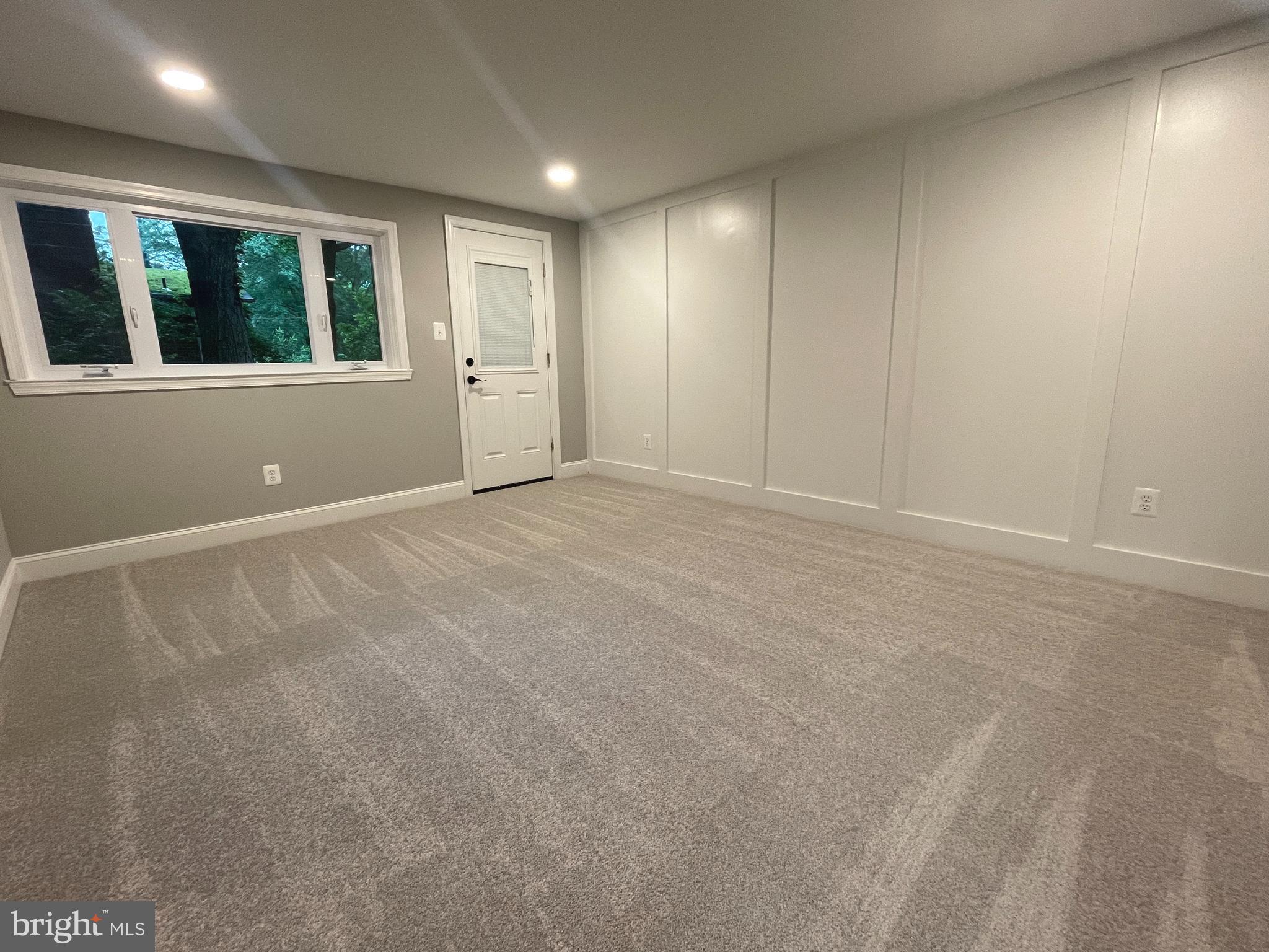 3610 Cornell Road Fairfax, VA 22030 - Photo 15 of 18 LL family room with accent wall & new carpet