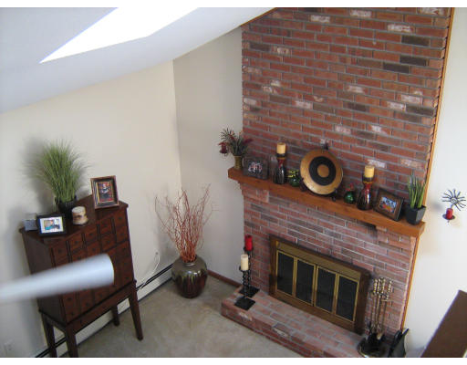46 Country View Street West Springfield, MA 01089 - Photo 8 of 14 a living room with furniture and a fireplace