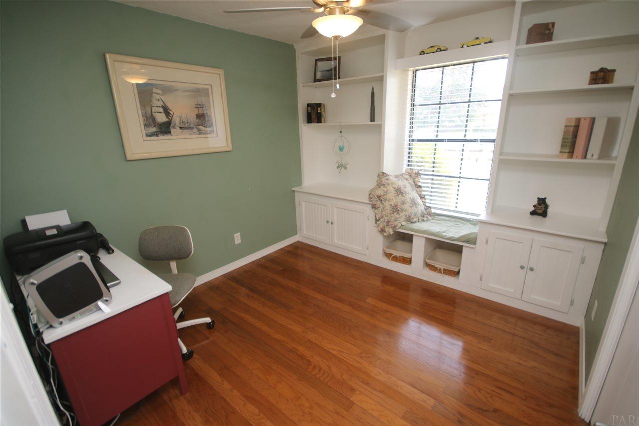 4296 Sea Port Road Pace, FL 32571 - Photo 41 of 50 with built-in bookcases & window seat.