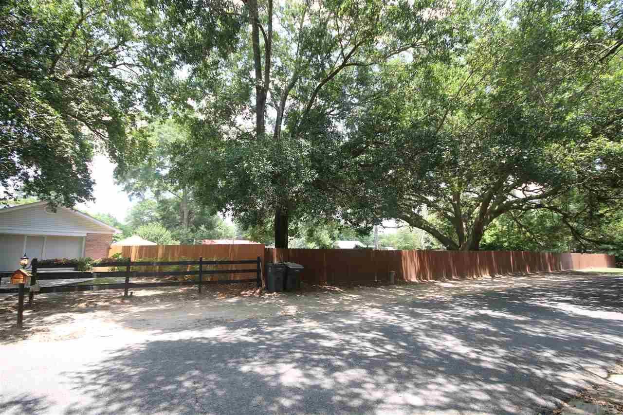 4296 Sea Port Road Pace, FL 32571 - Photo 50 of 50 Fence along this side with double drive gate.