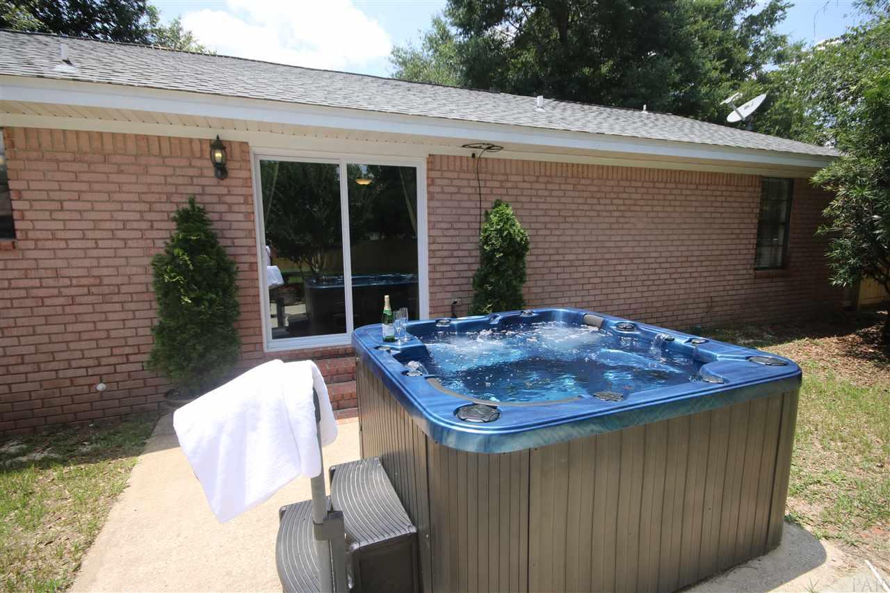 4296 Sea Port Road Pace, FL 32571 - Photo 7 of 50 2019. Easy access to hot tub with stairs.