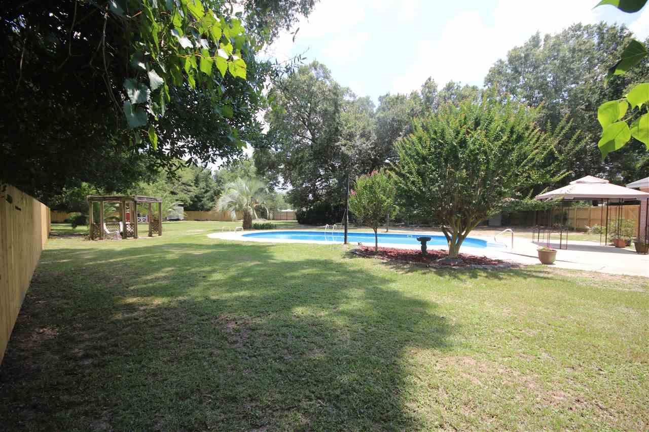 4296 Sea Port Road Pace, FL 32571 - Photo 8 of 50 2016. New sand filter & pump 2019.