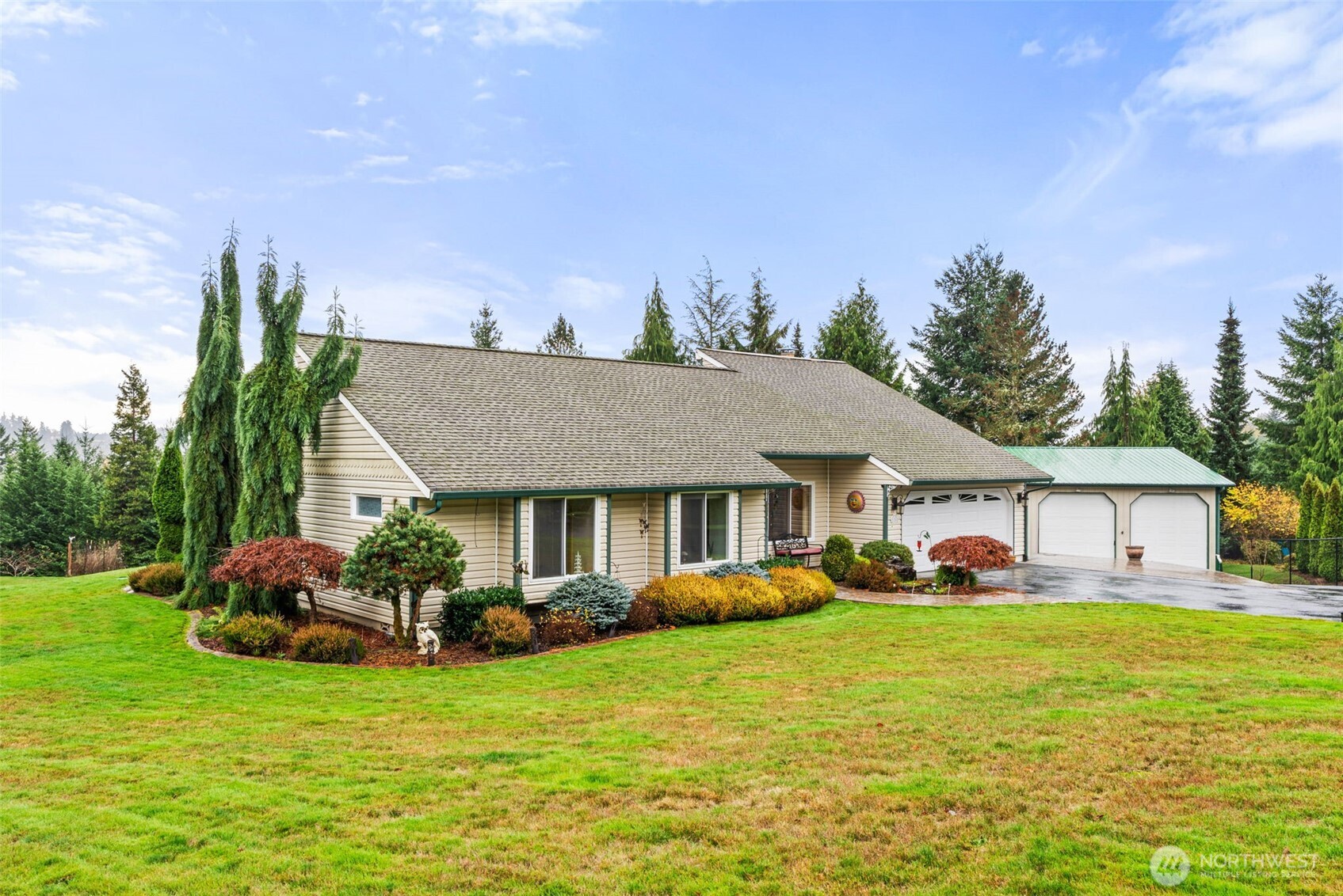 a house view with a garden space