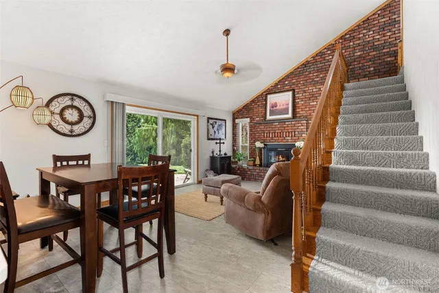 a view of a dining room with furniture window and outside view