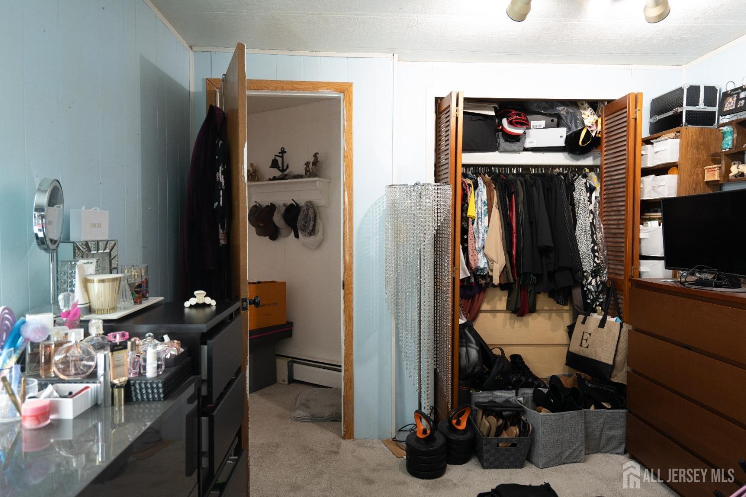 15 Dickens Road North Brunswick, NJ 08902 - Photo 23 of 38 a view of a workspace with furniture and gym equipment