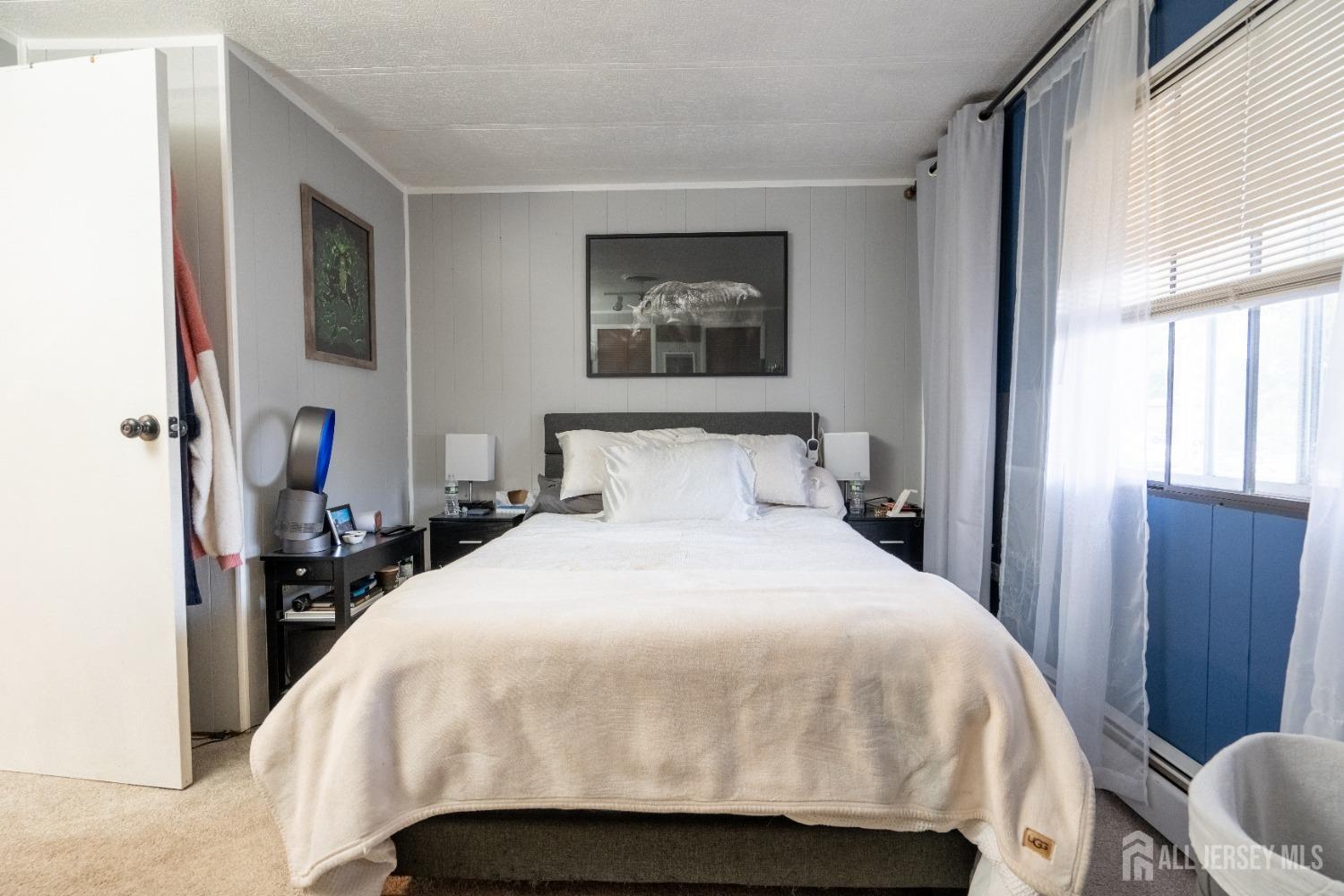 15 Dickens Road North Brunswick, NJ 08902 - Photo 29 of 38 a bedroom with a bed and a window