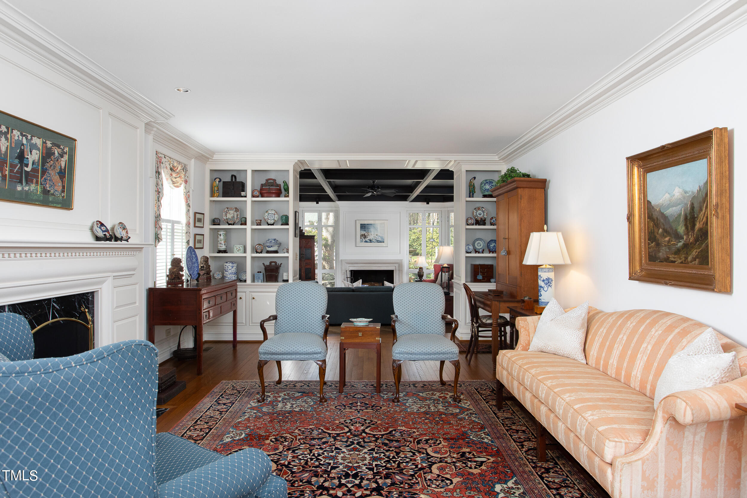 3940 Dover Road Durham, NC 27707 - Photo 17 of 72 a living room with furniture a fireplace and a table
