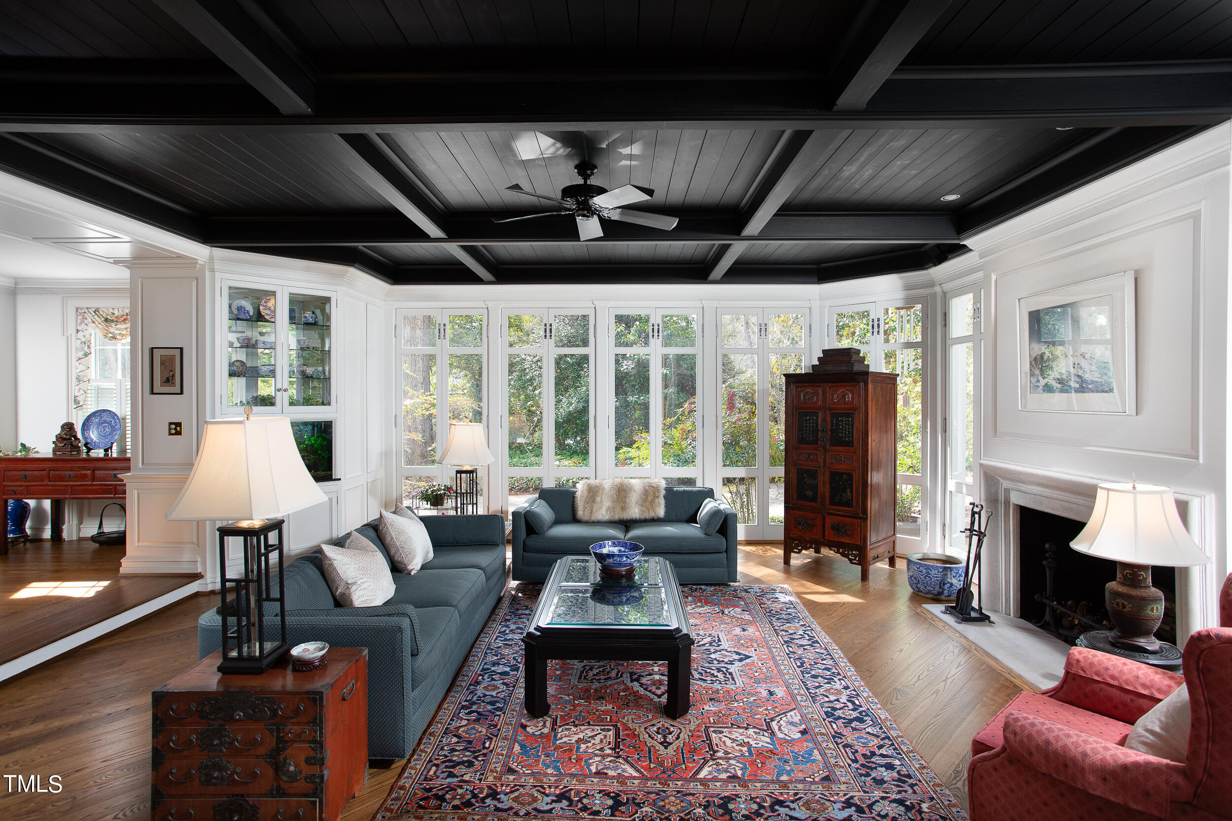 3940 Dover Road Durham, NC 27707 - Photo 19 of 72 a living room with furniture large window and a fireplace