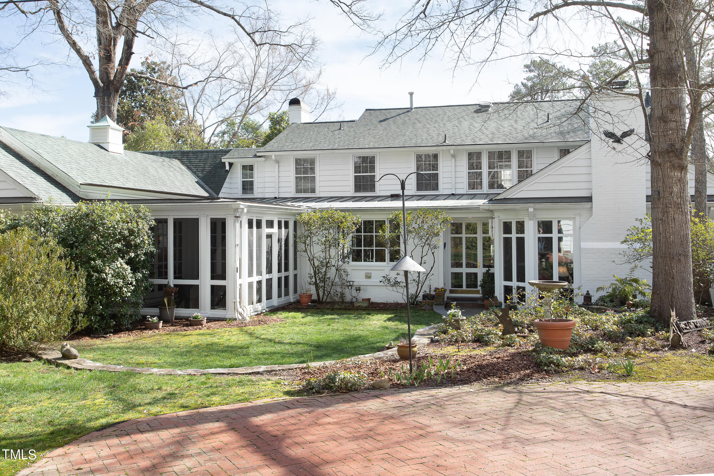 3940 Dover Road Durham, NC 27707 - Photo 29 of 72 a front view of a house with a garden