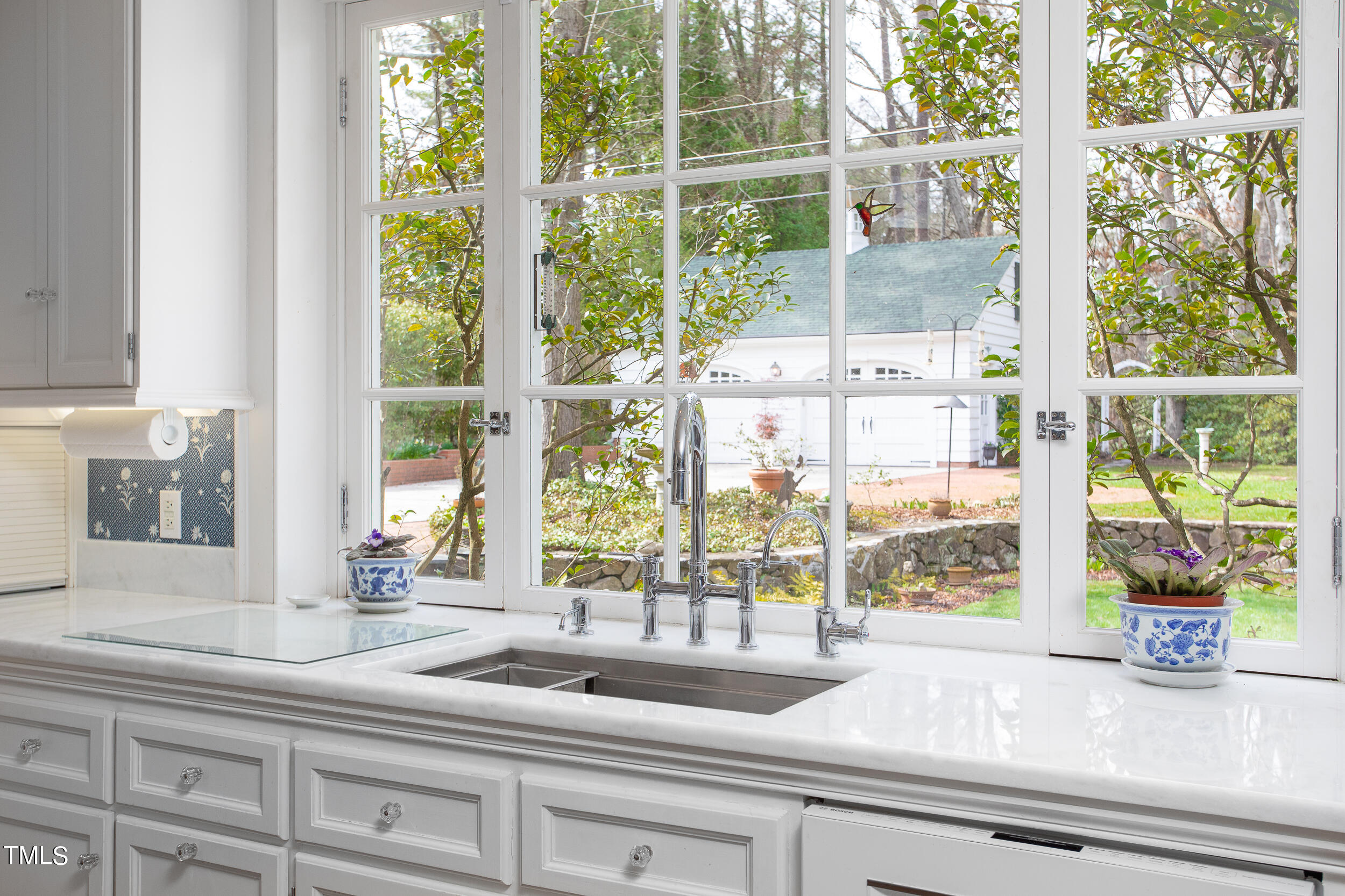 3940 Dover Road Durham, NC 27707 - Photo 32 of 72 a kitchen with a sink and a large window