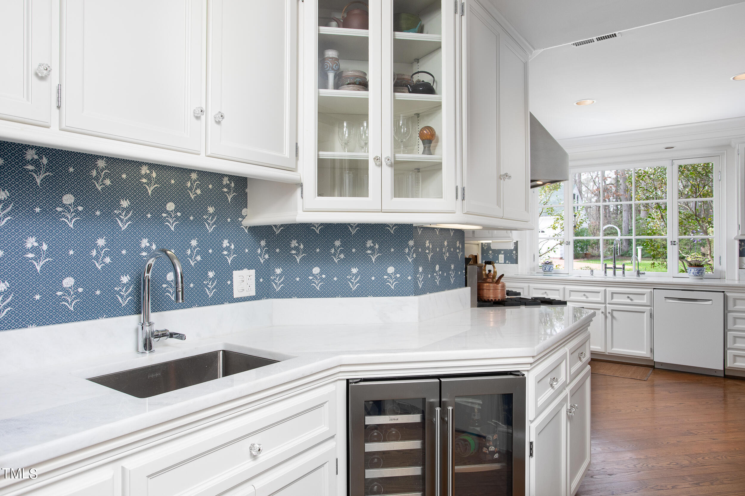 3940 Dover Road Durham, NC 27707 - Photo 35 of 72 a kitchen with a sink and cabinets