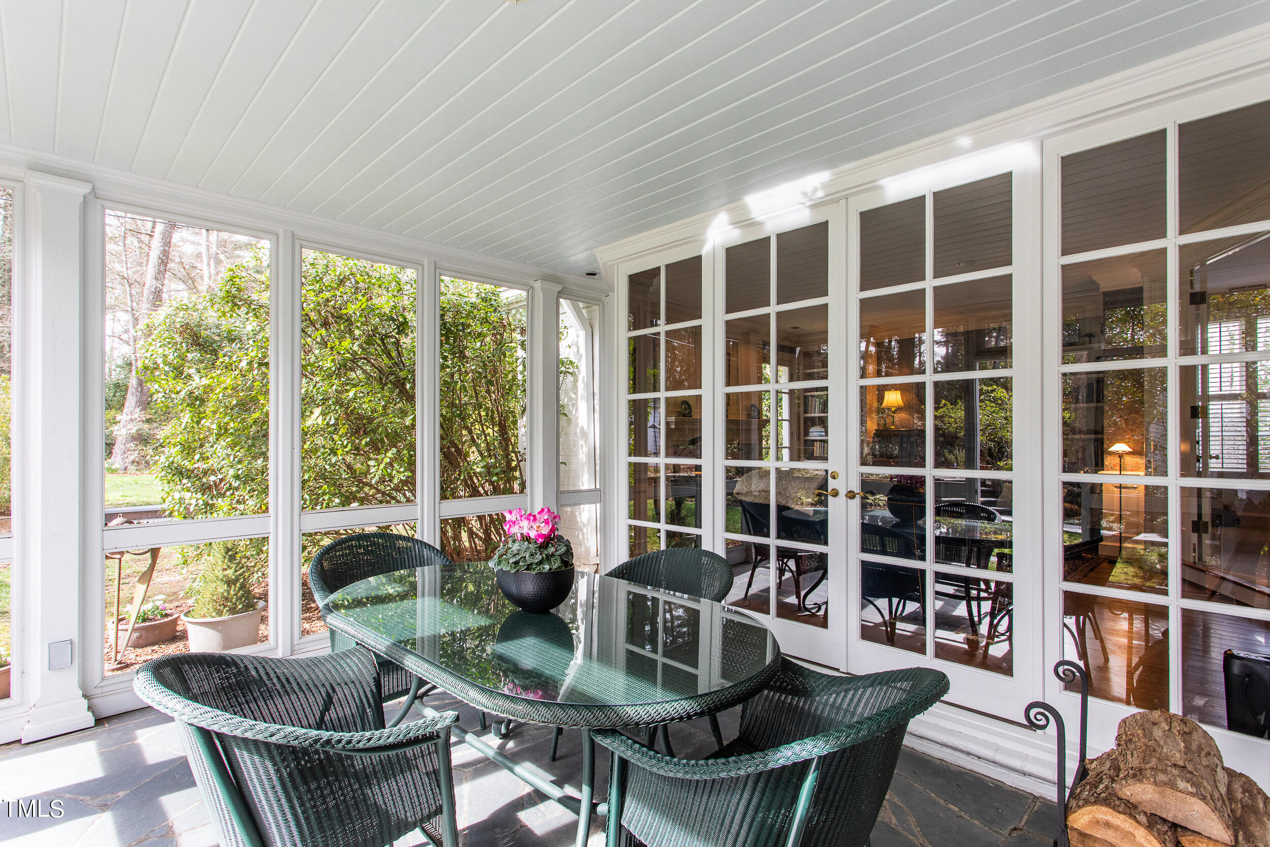 3940 Dover Road Durham, NC 27707 - Photo 38 of 72 a dining room with furniture and a potted plant