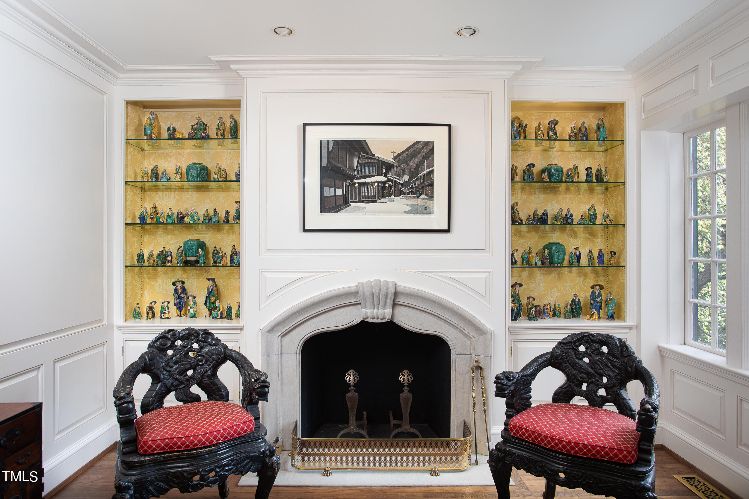 3940 Dover Road Durham, NC 27707 - Photo 49 of 72 a living room with furniture and a fireplace