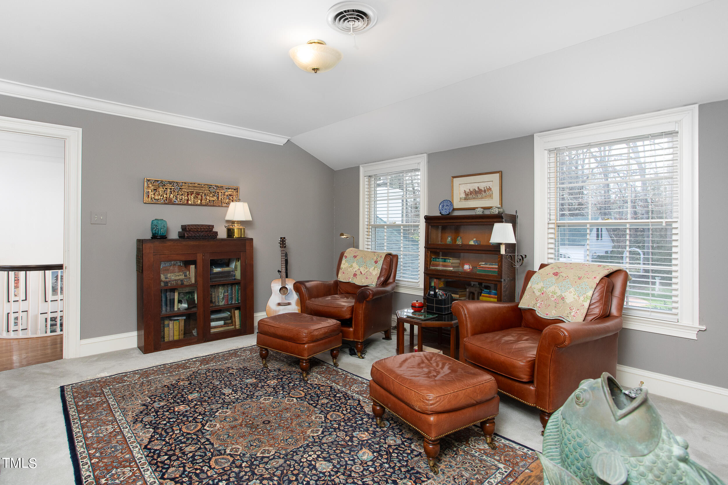 3940 Dover Road Durham, NC 27707 - Photo 54 of 72 a living room with furniture a rug and a large window