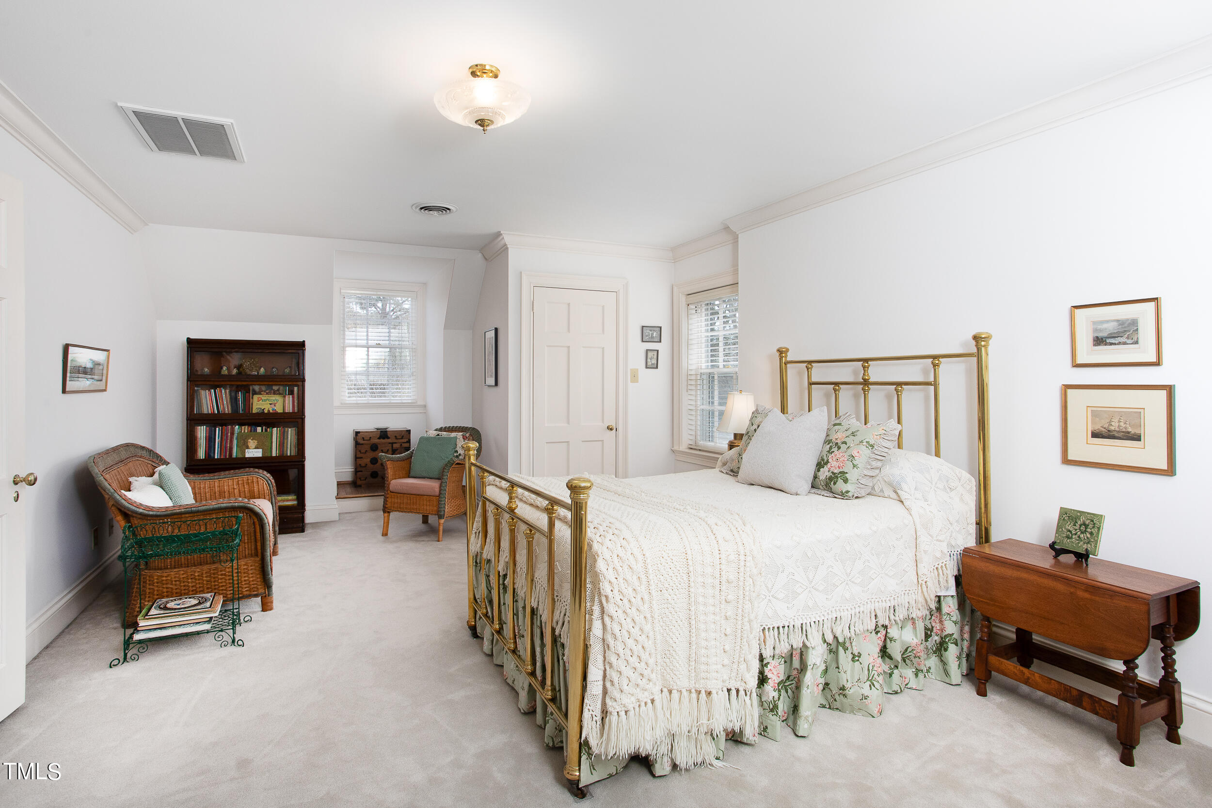 3940 Dover Road Durham, NC 27707 - Photo 56 of 72 a bedroom with furniture and a couch