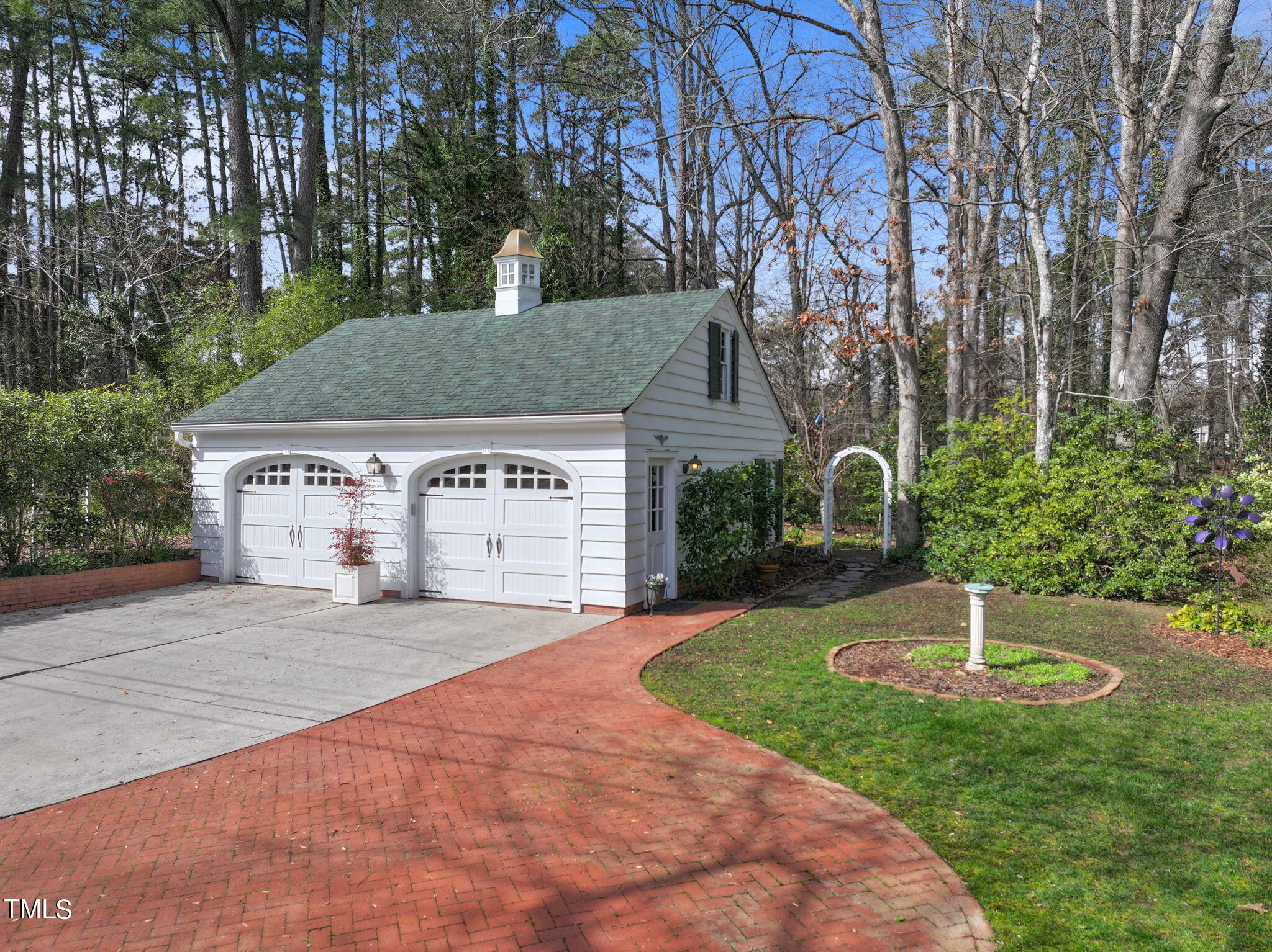 3940 Dover Road Durham, NC 27707 - Photo 61 of 72 a front view of a house with a yard and garage