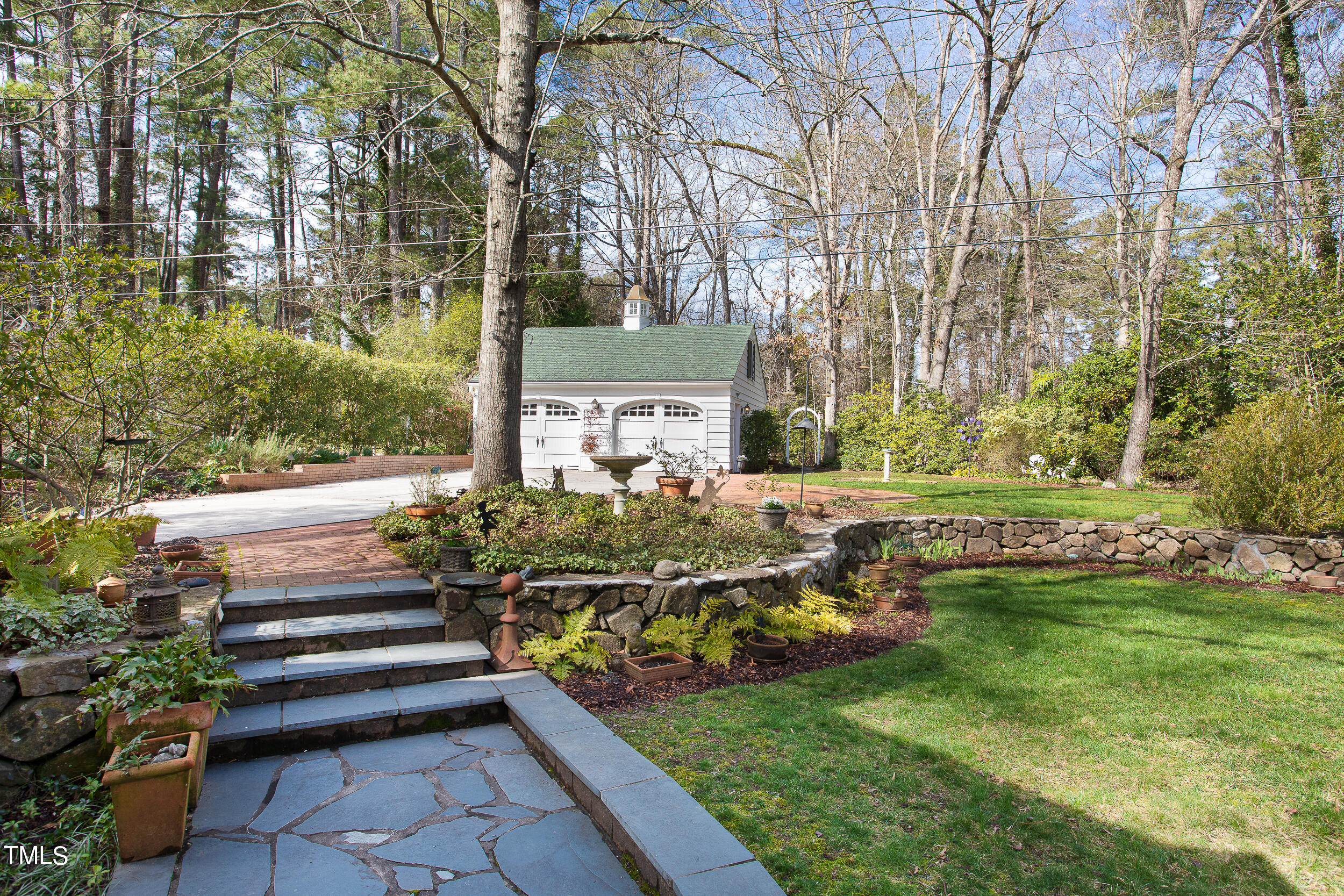 3940 Dover Road Durham, NC 27707 - Photo 63 of 72 a view of a bench in a yard