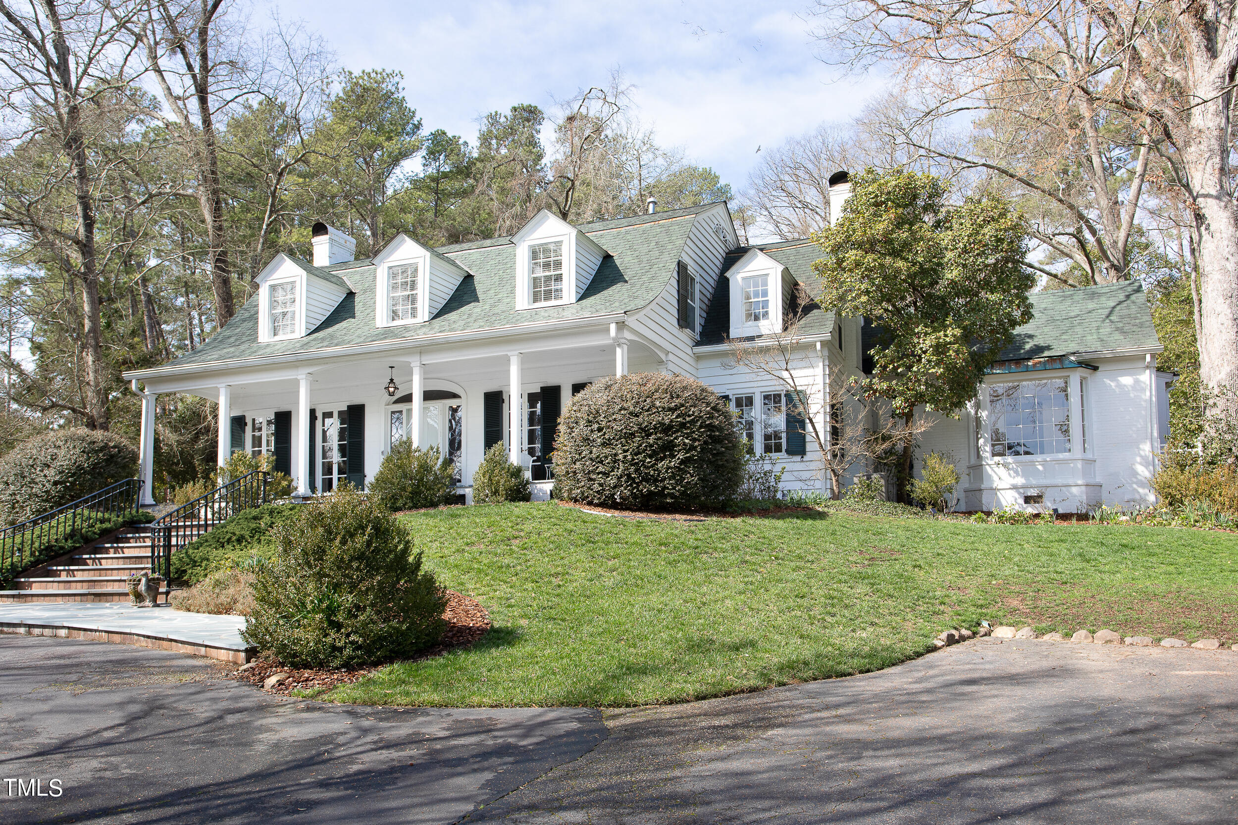 3940 Dover Road Durham, NC 27707 - Photo 67 of 72 a front view of a house with a garden