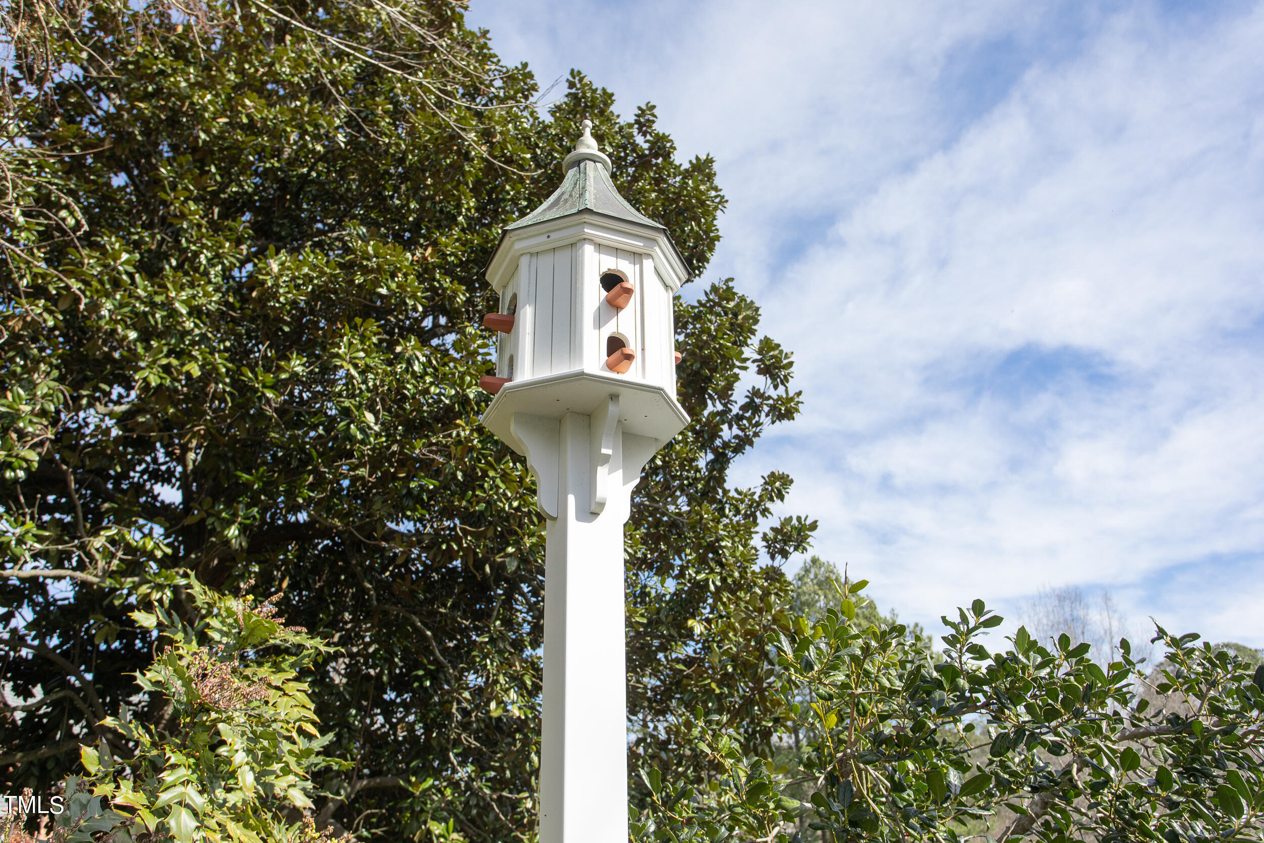 3940 Dover Road Durham, NC 27707 - Photo 8 of 72 a front view of a house with a yard and fountain