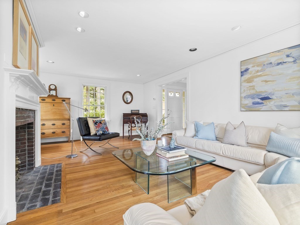 33 Longmeadow Road Wellesley, MA 02482 - Photo 5 of 15 a living room with furniture a rug and kitchen view