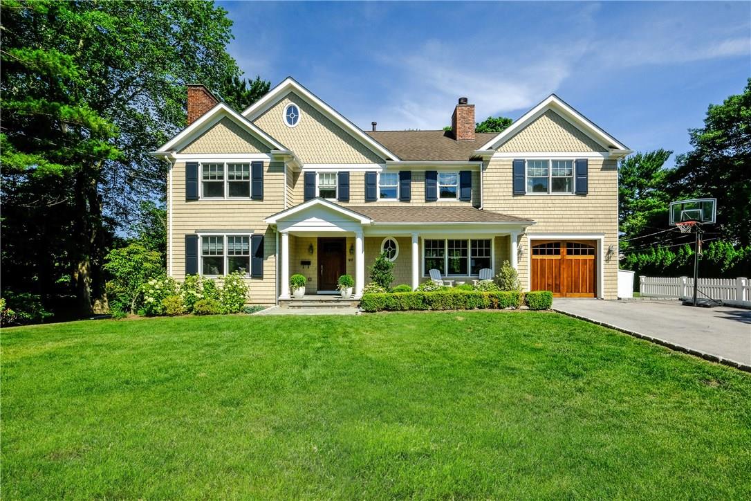 97 Fairway Avenue Rye, NY 10580 - Photo 1 of 1 a front view of a house with a yard table and chairs