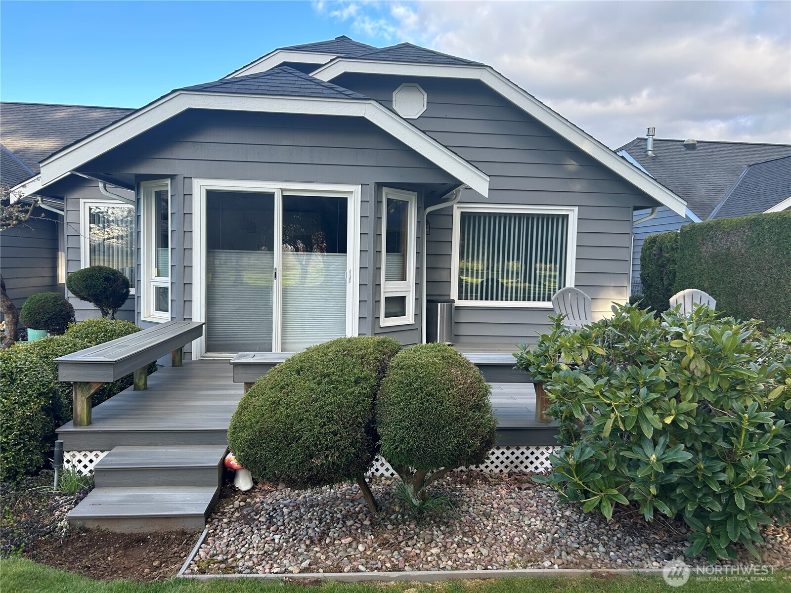 6850 Raspberry Dr., Unit A Everson, WA 98247 - Photo 20 of 22 a front view of a house with garden