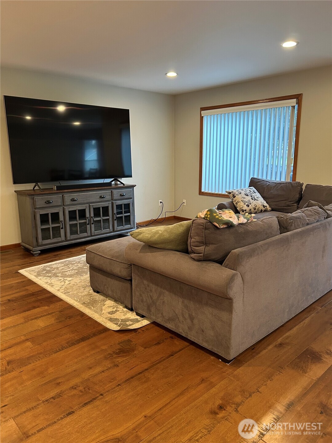 6850 Raspberry Dr., Unit A Everson, WA 98247 - Photo 6 of 22 a living room with furniture and a flat screen tv