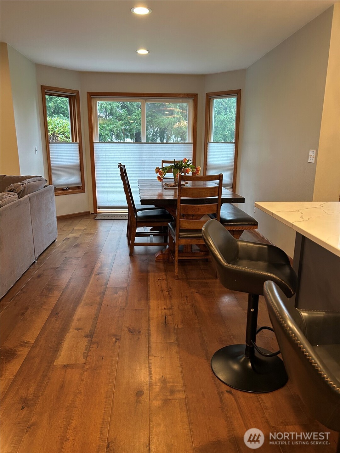 6850 Raspberry Dr., Unit A Everson, WA 98247 - Photo 7 of 22 a living room with furniture and a floor to ceiling window