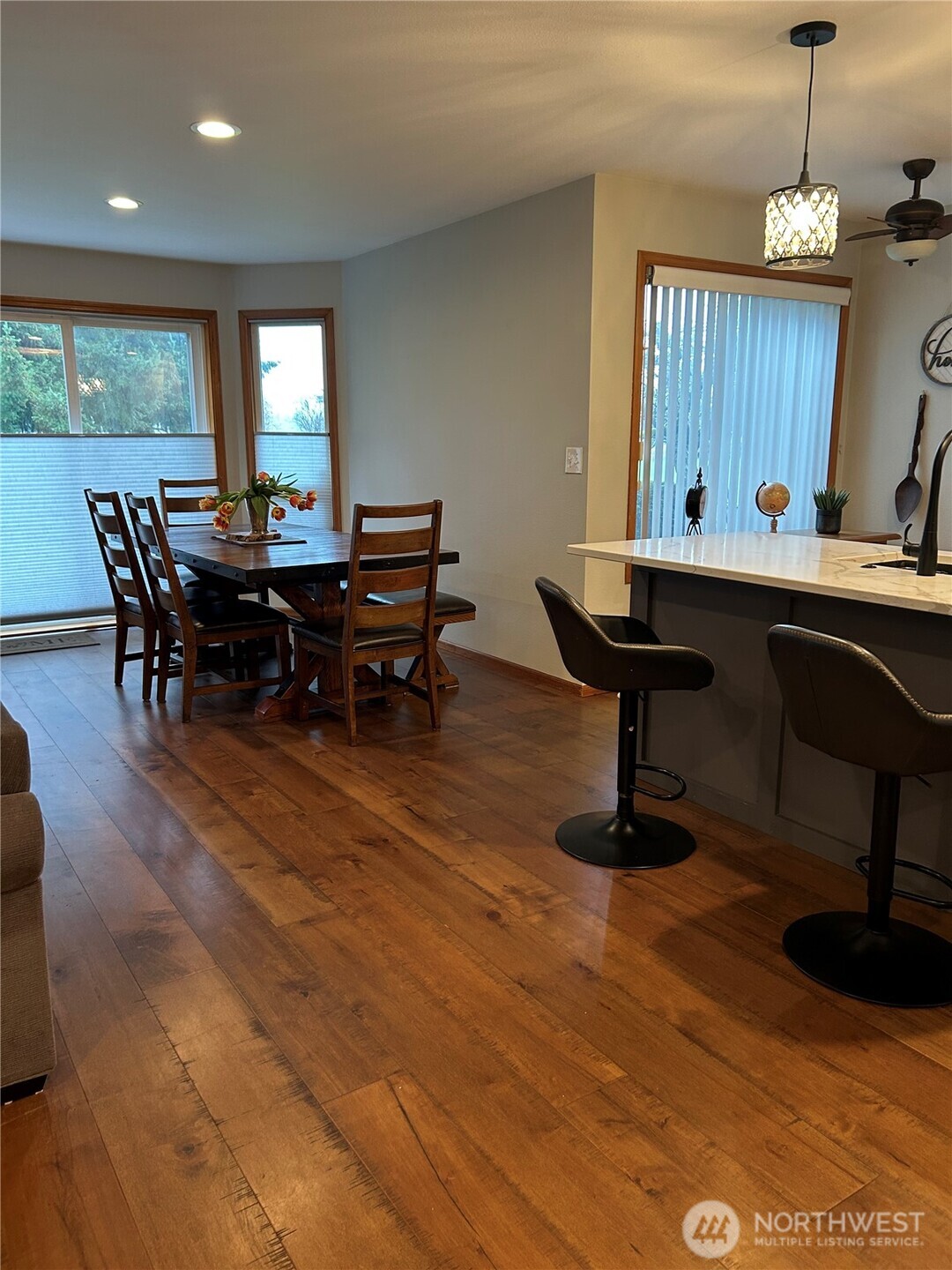 6850 Raspberry Dr., Unit A Everson, WA 98247 - Photo 8 of 22 a view of a dining room with furniture window and wooden floor
