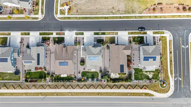 front view of white building with glass windows