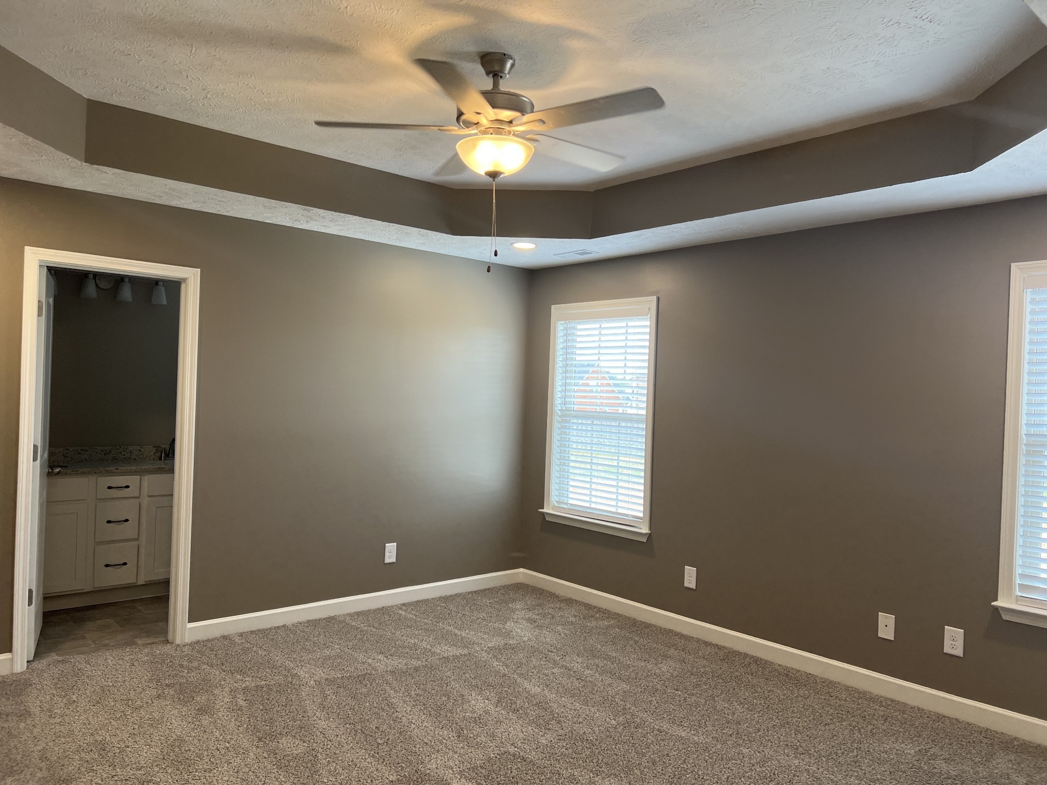 1 Dorsch Road Manchester, TN 37355 - Photo 4 of 11 an empty room that has a window and a ceiling fan