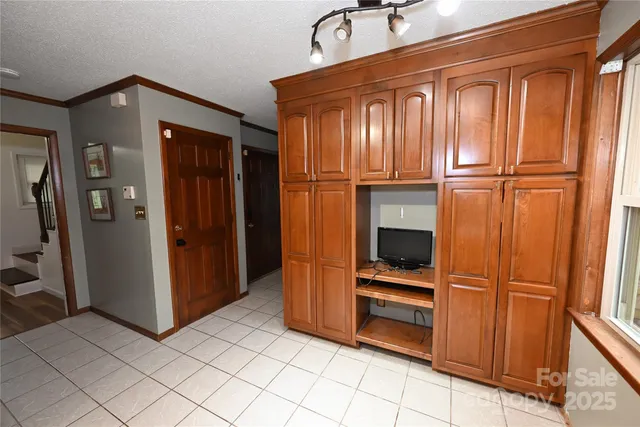 a kitchen with stainless steel appliances a refrigerator and a sink