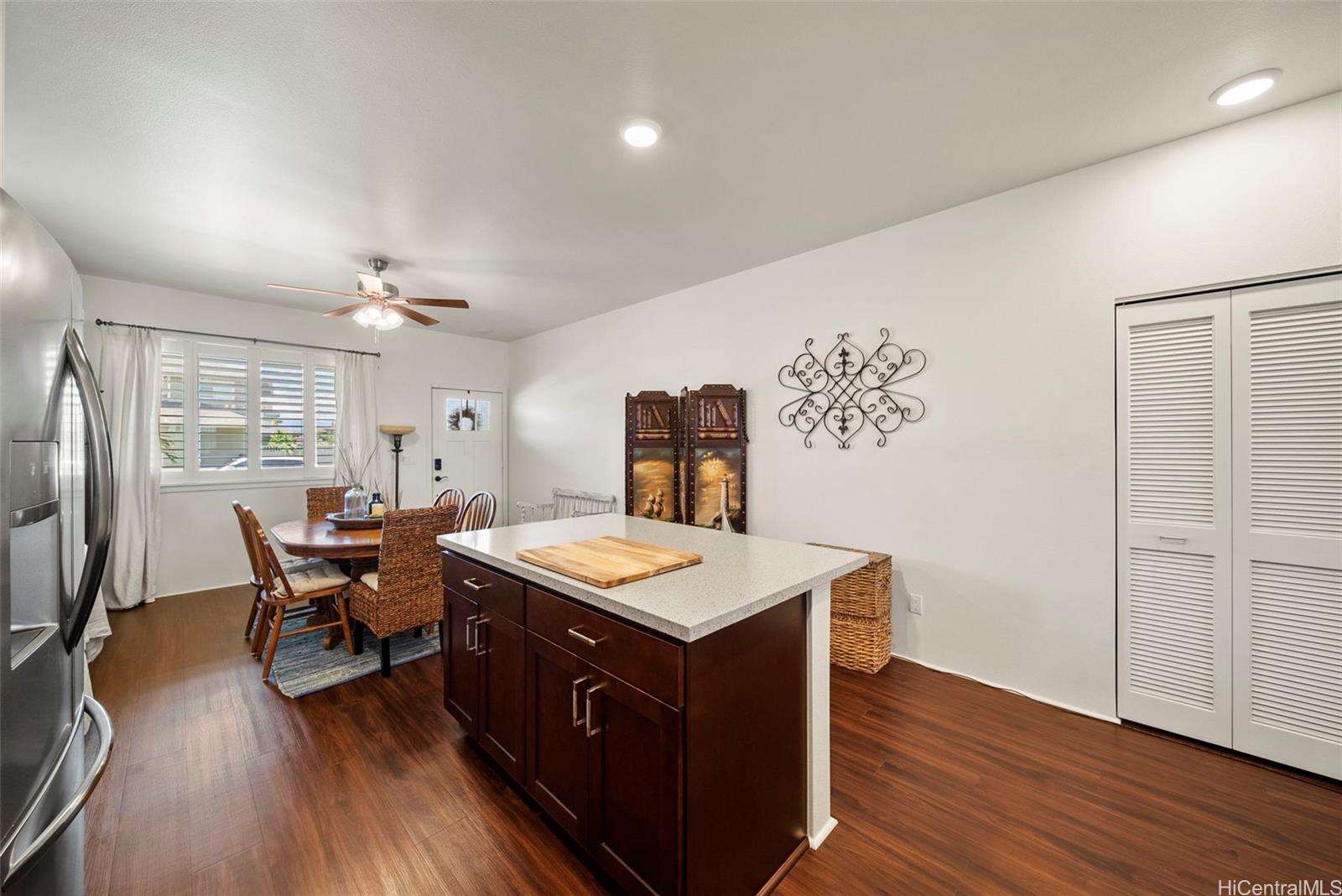 91-1129 Iliahialoe Loop Ewa Beach, HI 96706 - Photo 11 of 25 a view of a kitchen counter space and wooden floor