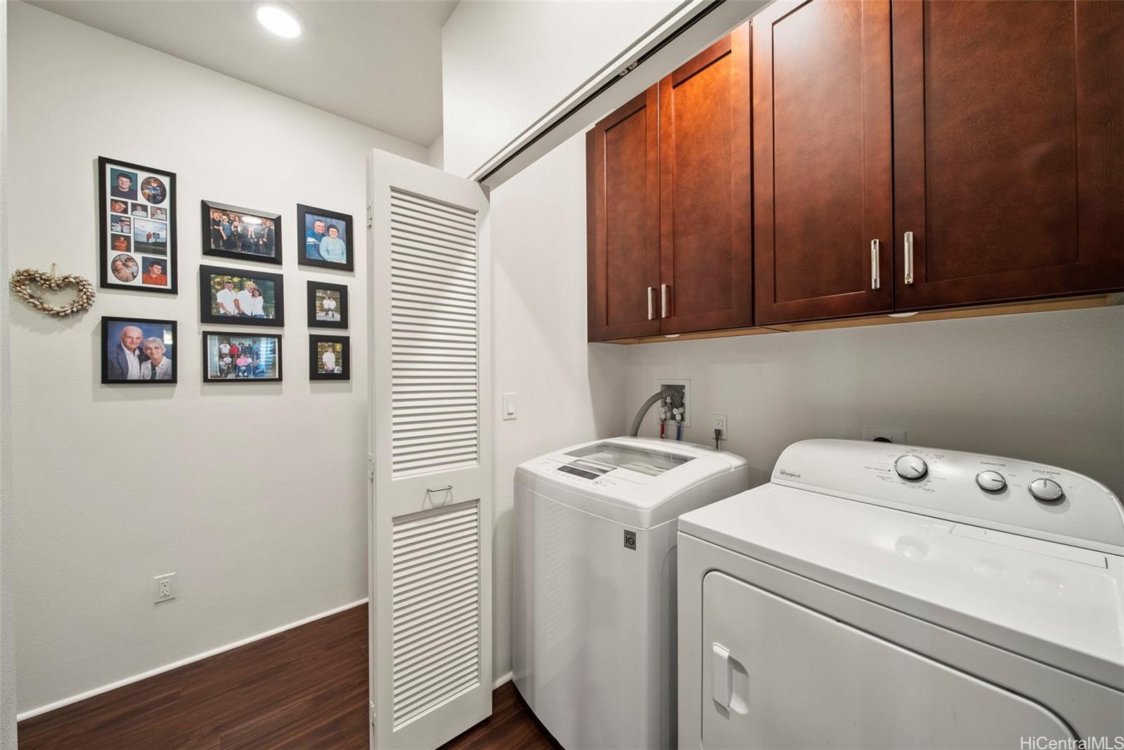 91-1129 Iliahialoe Loop Ewa Beach, HI 96706 - Photo 16 of 25 a view of storage and utility room with washer and dryer