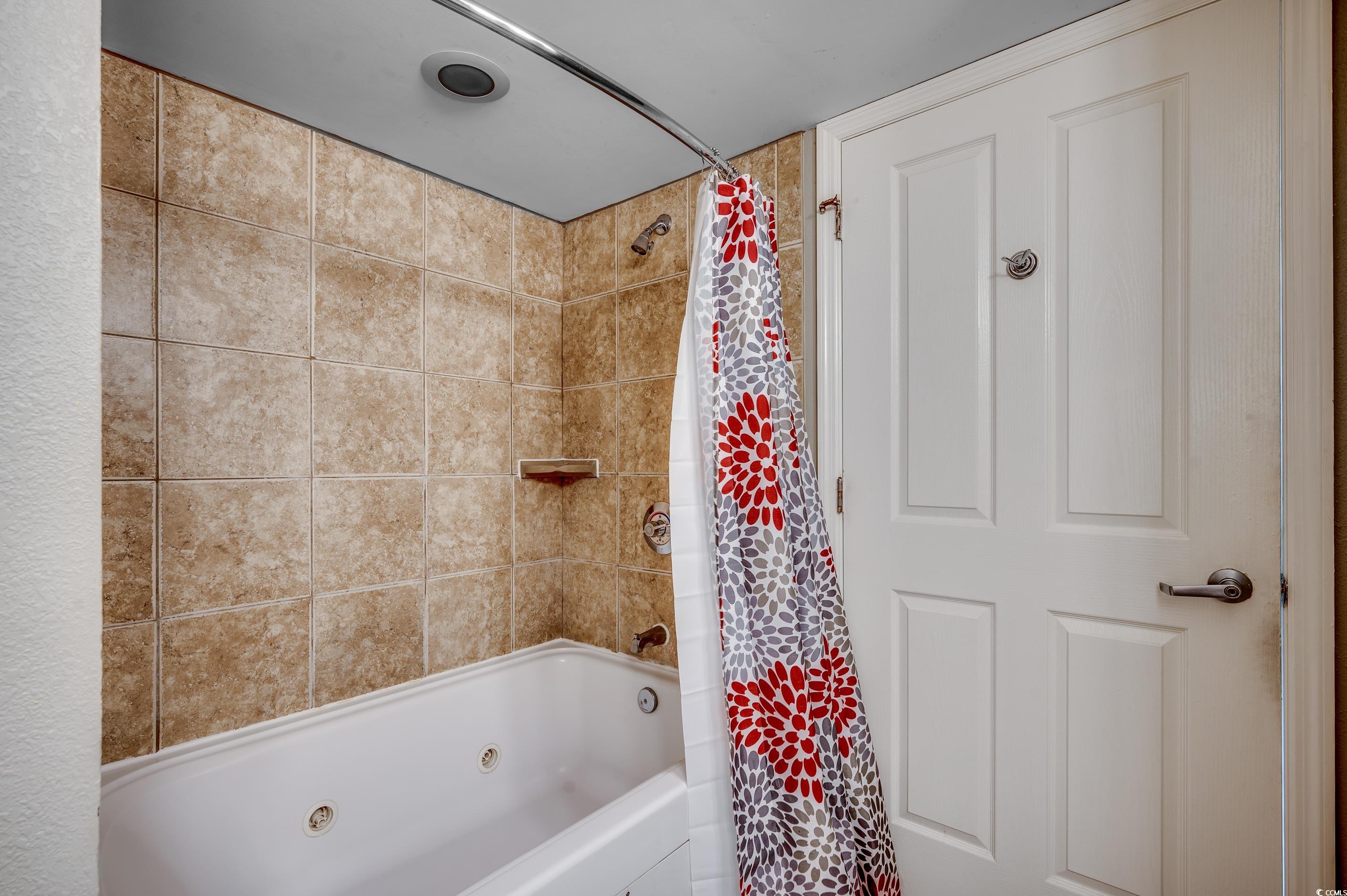 5200 North Ocean Boulevard, Unit 1037 Myrtle Beach, SC 29577 - Photo 11 of 40 Bathroom with a combined bath / shower with jetted tub