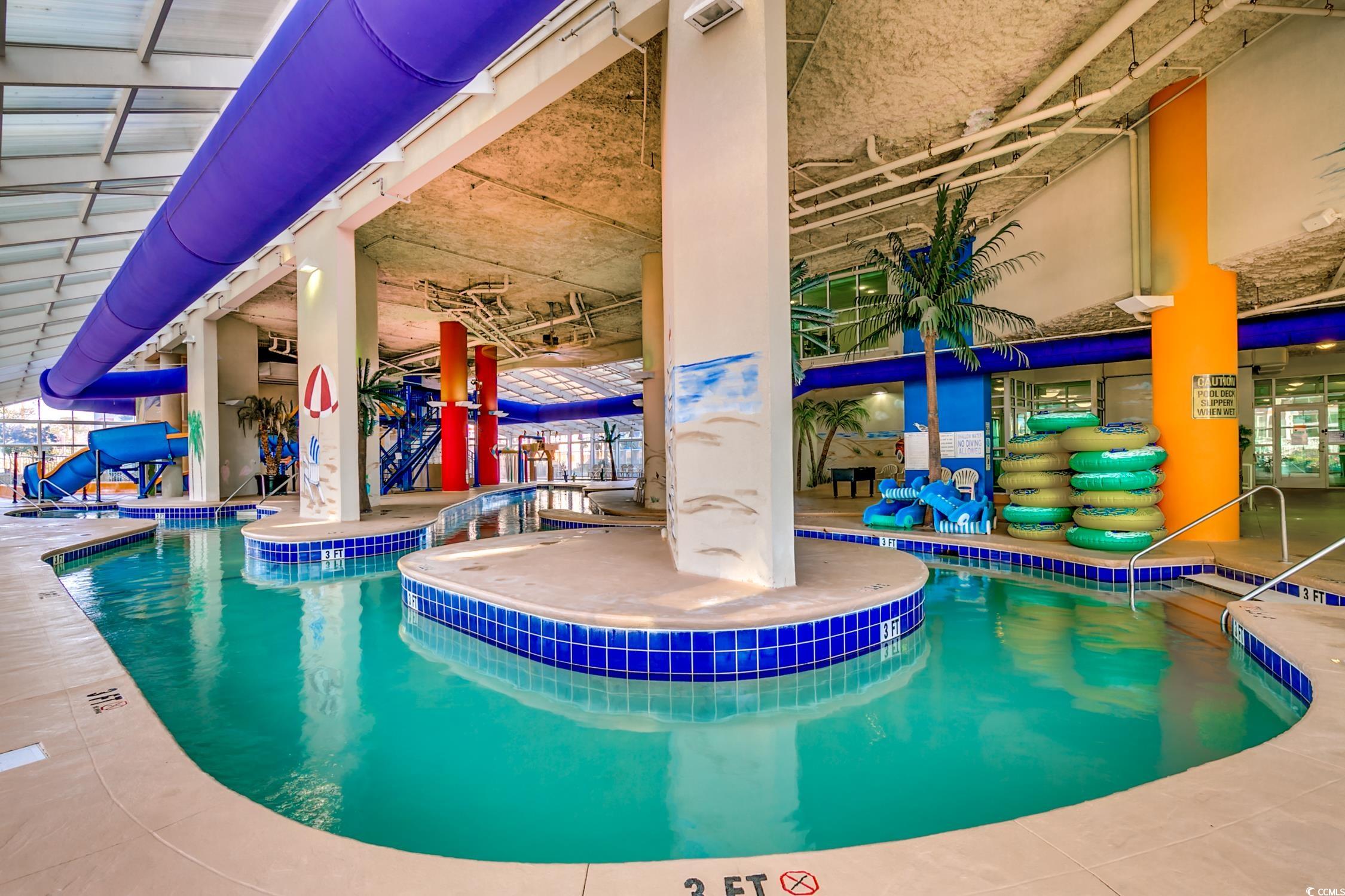 5200 North Ocean Boulevard, Unit 1037 Myrtle Beach, SC 29577 - Photo 33 of 40 Indoor community pool with a patio area
