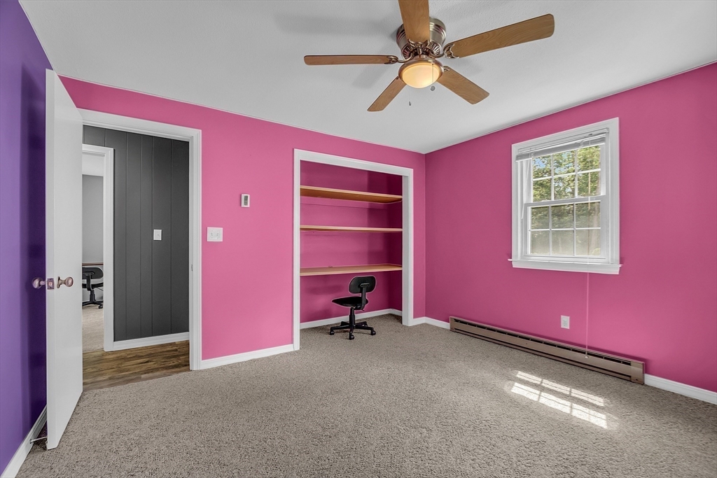 112 Walker Road Shirley, MA 01464 - Photo 21 of 33 a room with furniture and a ceiling fan