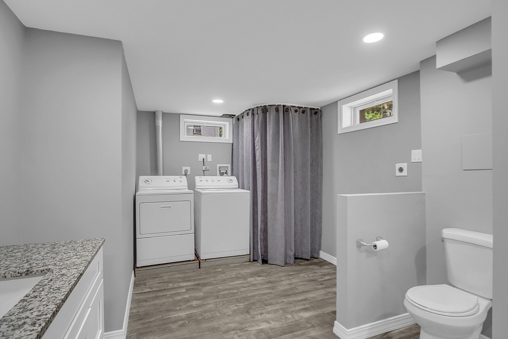 112 Walker Road Shirley, MA 01464 - Photo 30 of 33 a bathroom with a sink a toilet and shower