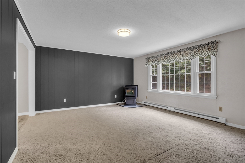 112 Walker Road Shirley, MA 01464 - Photo 8 of 33 an empty room with windows