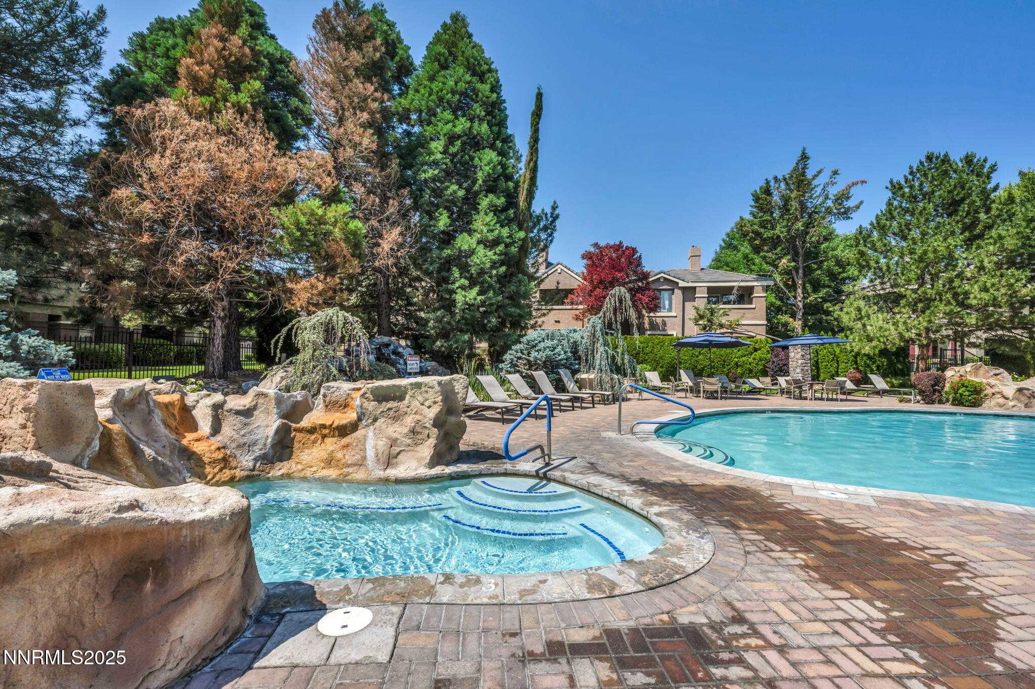 900 South Meadows Parkway, Unit 814 Reno, NV 89521 - Photo 33 of 43 a view of a swimming pool with a patio