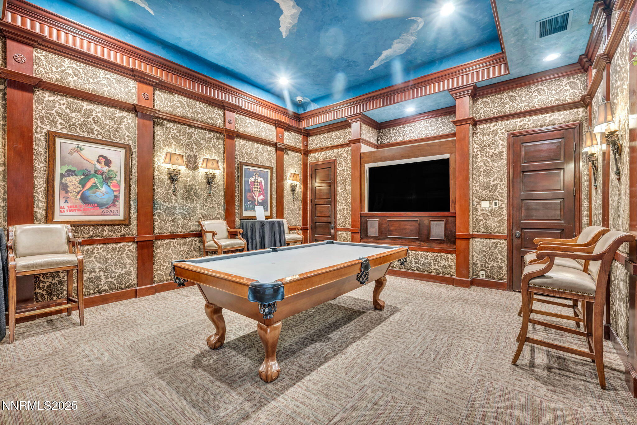 900 South Meadows Parkway, Unit 814 Reno, NV 89521 - Photo 36 of 43 a living room with furniture a flat screen tv and floor to ceiling window