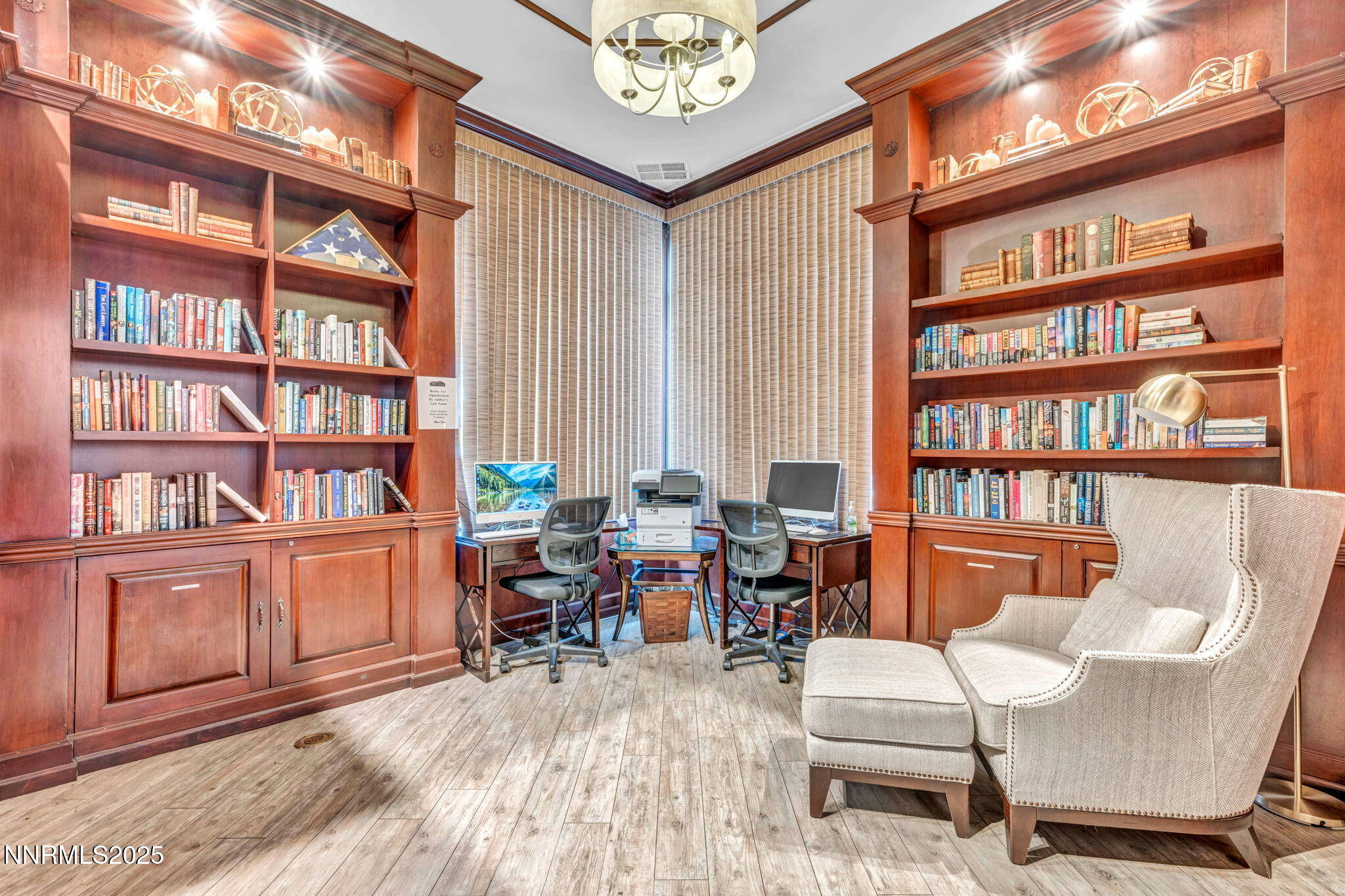 900 South Meadows Parkway, Unit 814 Reno, NV 89521 - Photo 37 of 43 a work room with furniture and a book shelf