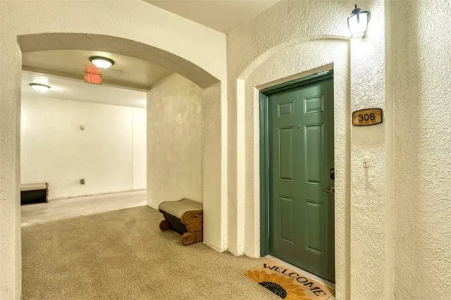 a bathroom with a tub and shower