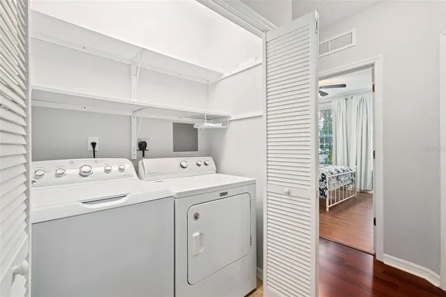 a utility room with dryer and washer