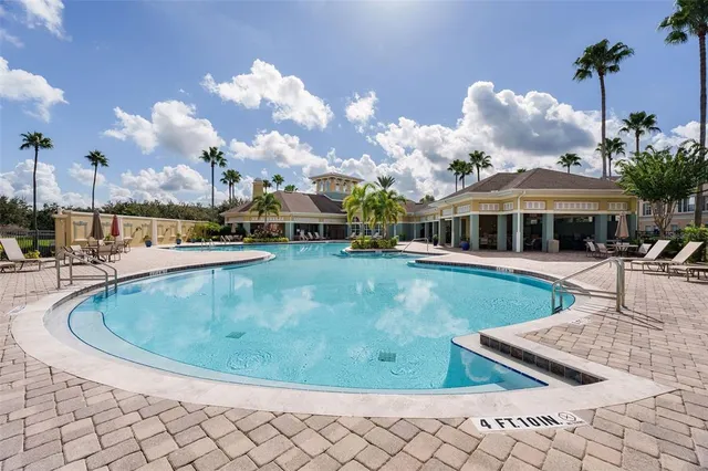 a view of a house with a swimming pool