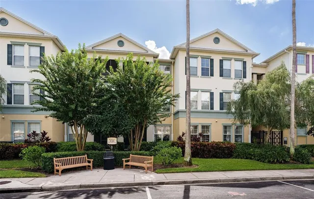 a front view of a building with garden