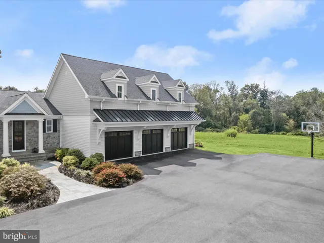 a view of a city with lush green forest