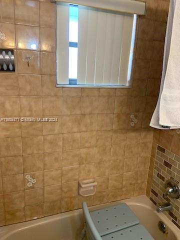 11861 Southwest 18th Street, Unit 329 Miami, FL 33175 - Photo 15 of 23 a bathroom with a shower