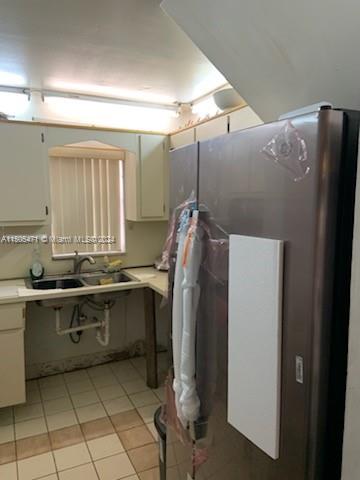 11861 Southwest 18th Street, Unit 329 Miami, FL 33175 - Photo 19 of 23 a kitchen with stainless steel appliances granite countertop a refrigerator and a sink
